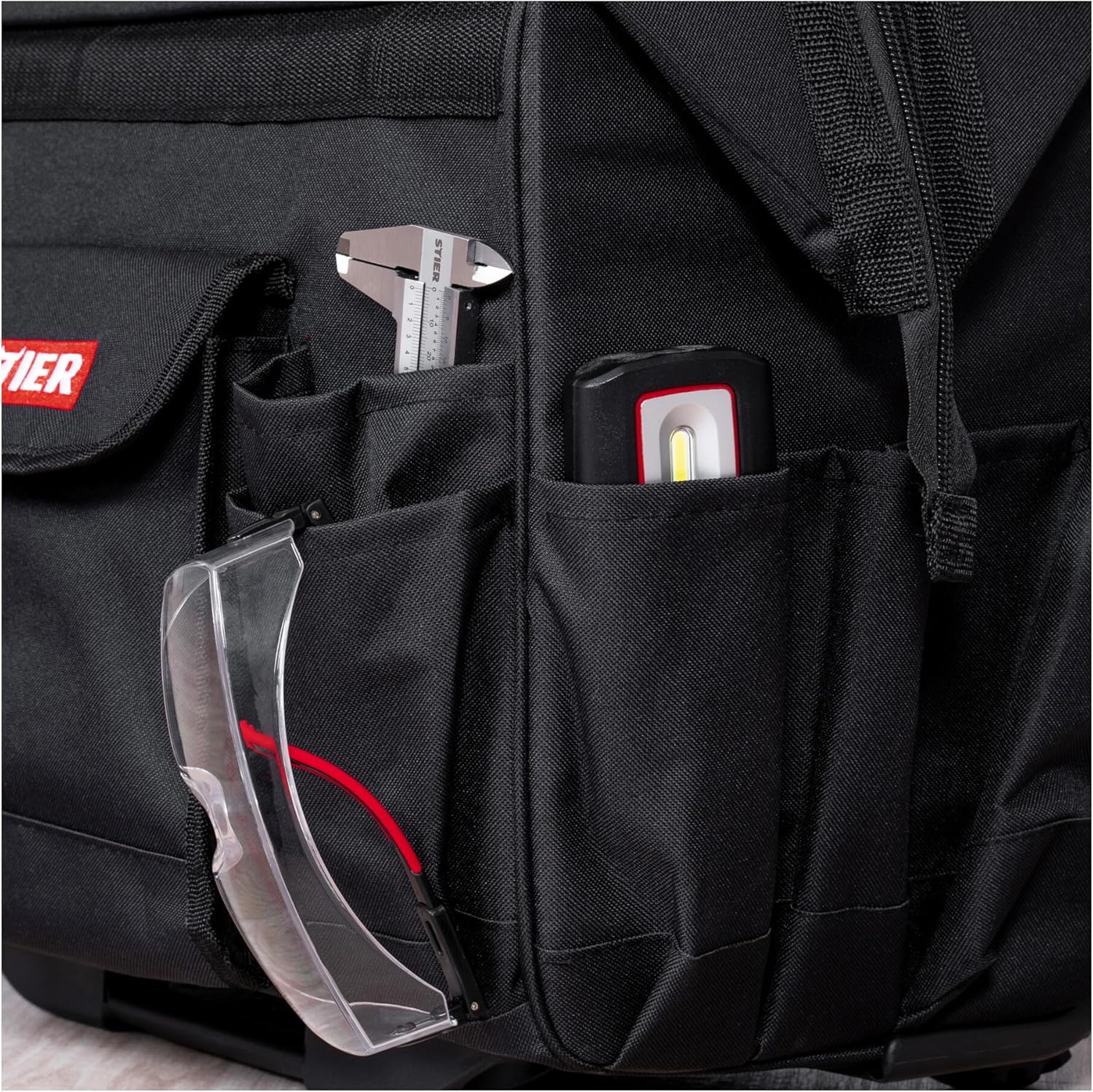 ⚡ Elektro & Technik – STIER Premium+ Werkzeugwagen, leer und unbestückt, schwarzer Werkzeugkasten, reißfestes Polyester, 19 Fächer, leichtgängige Rollen und ergonomischer Griff für bequemen Transport – Bild 3